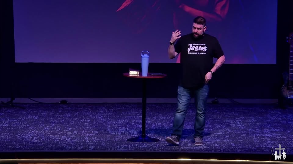 A speaker sharing a message at Faith Family Church